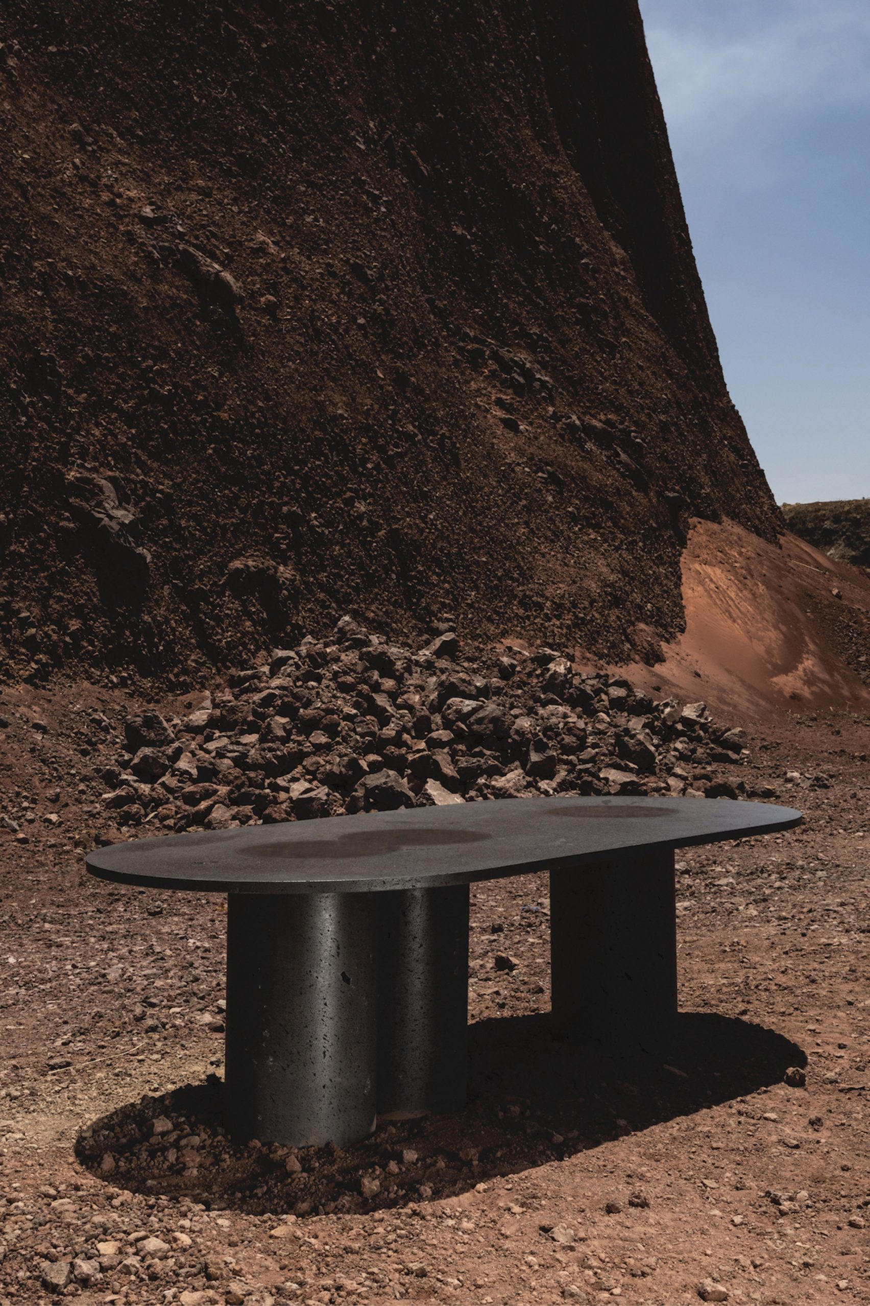 Peca’s Petra eating table commends the “crude excellence” of volcanic stone